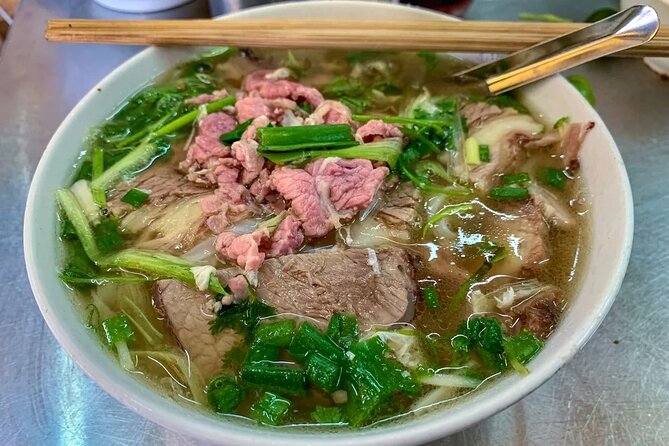 Walking Street Food Tour in Hanoi and Train Street - Banh xeo, banh mi, and Vietnamese salad